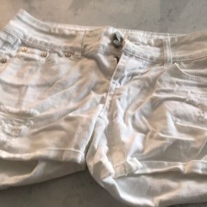 Distressed white shorts